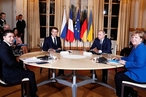 Путин обсудил ситуацию в Донбассе с Меркель и Макроном